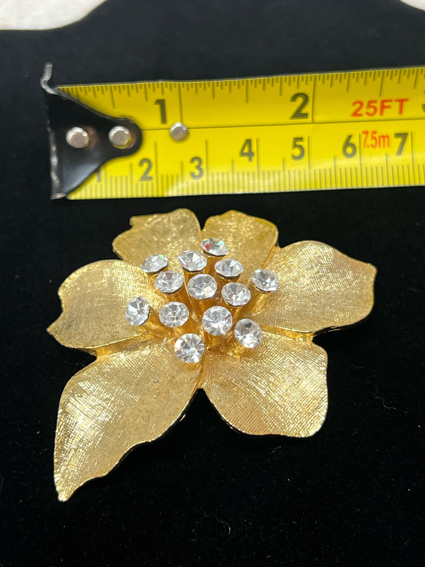 Vintage goldtone and rhinestone floral pin