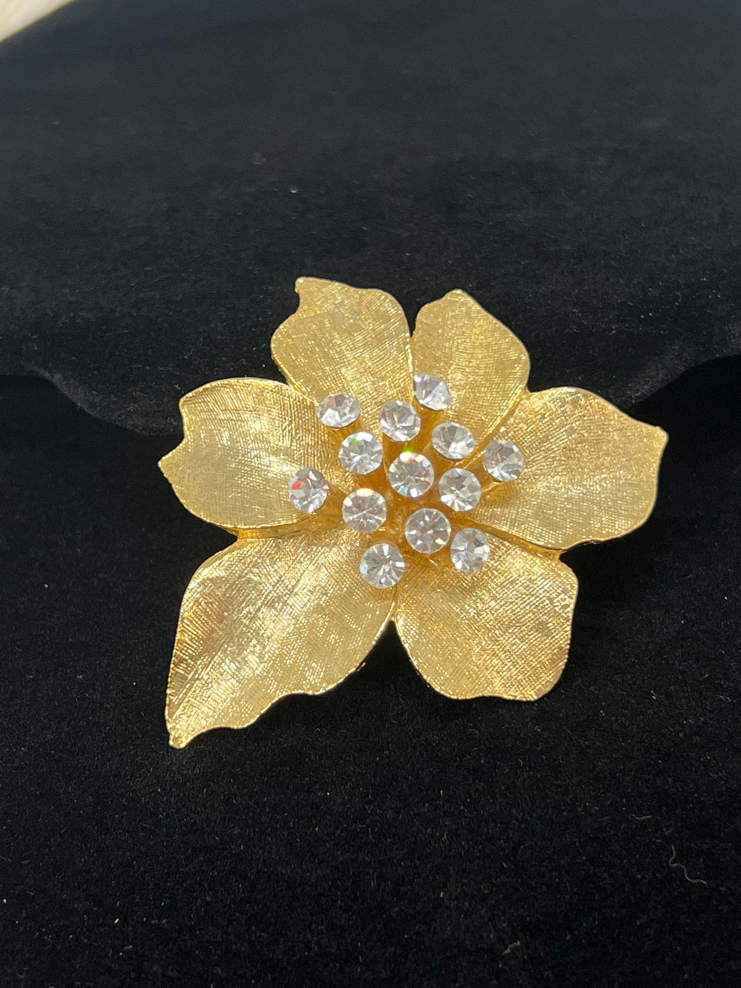 Vintage goldtone and rhinestone floral pin