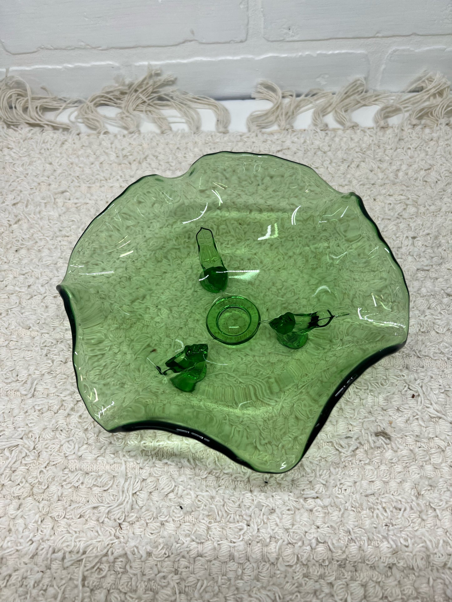 Small green glass footed bowl