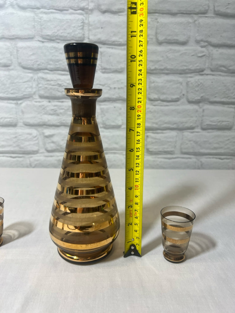 MCM Striped decanter w/ glass stopper and four glasses