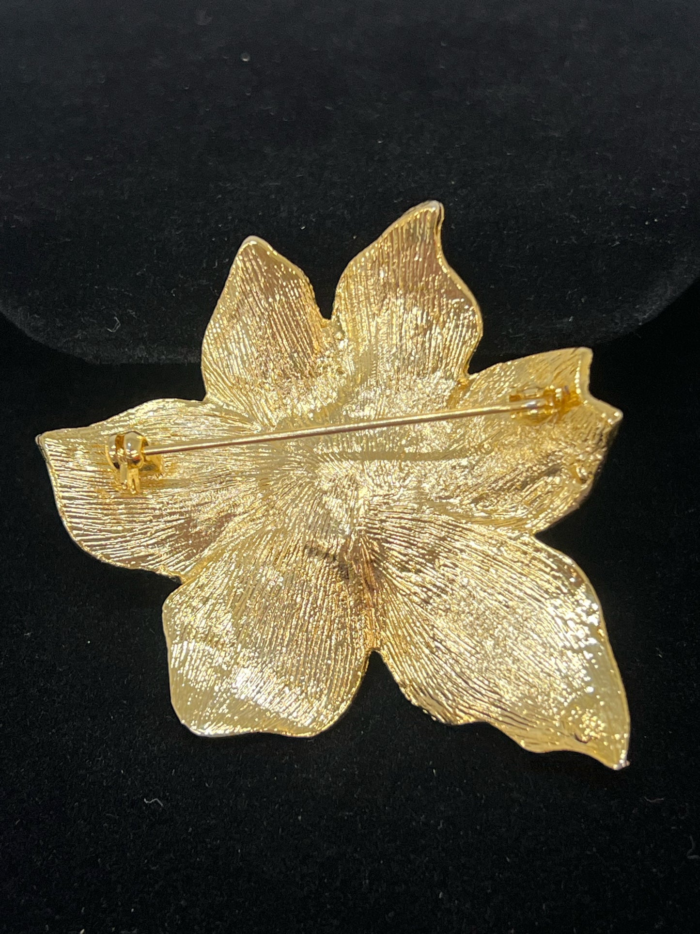 Vintage goldtone and rhinestone floral pin