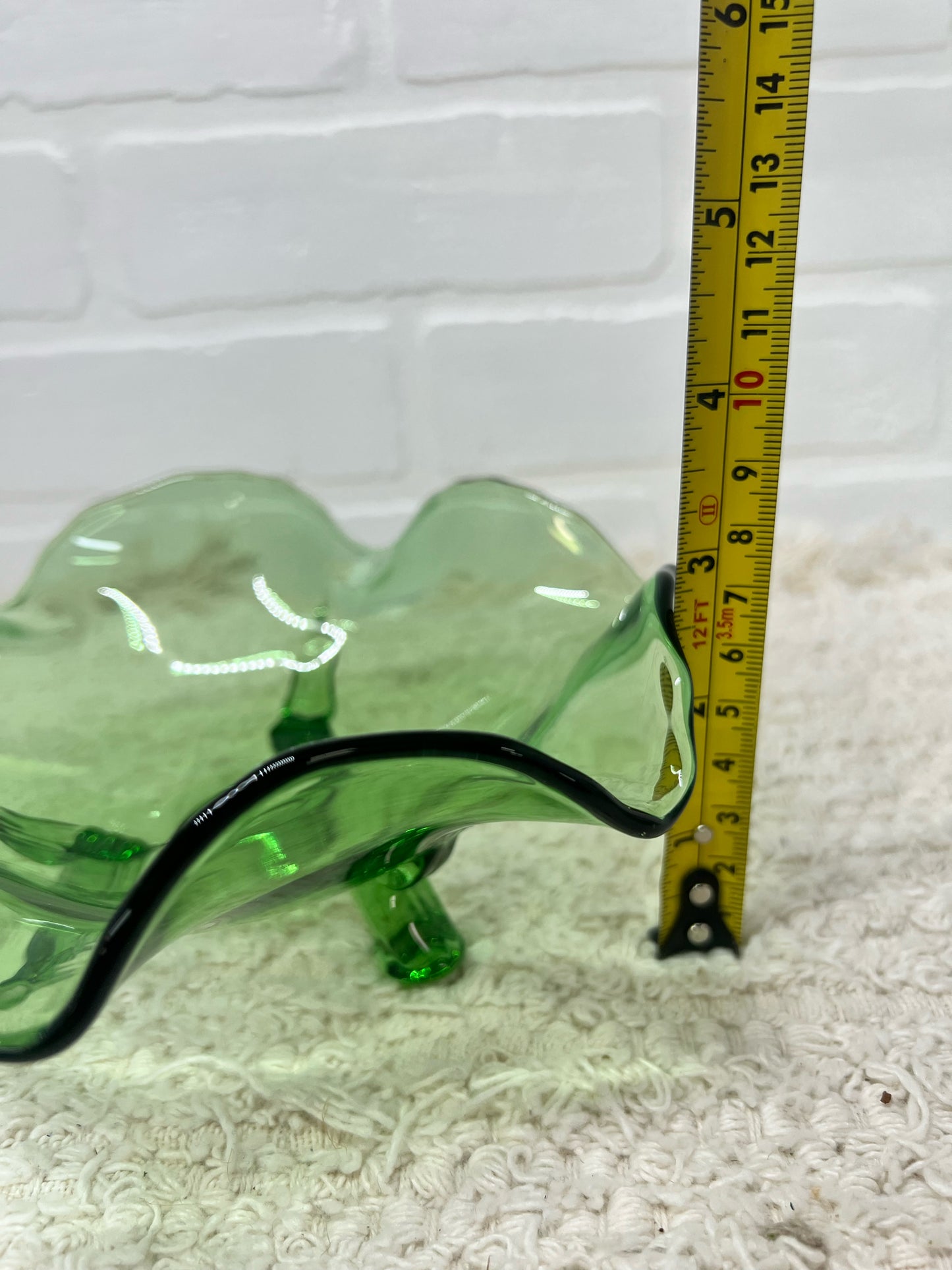 Small green glass footed bowl