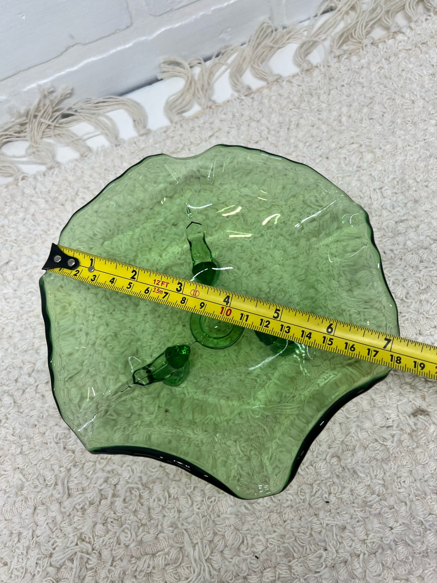 Small green glass footed bowl