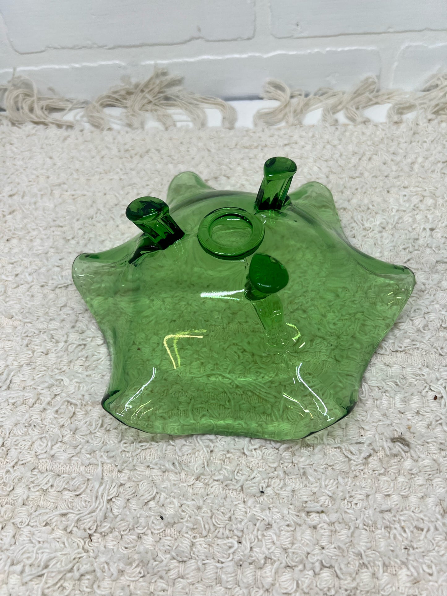 Small green glass footed bowl