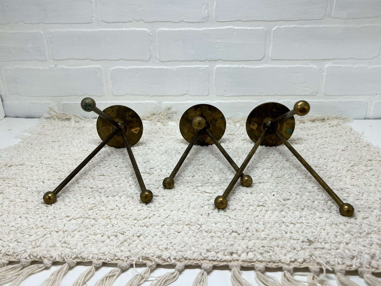 Trio of brass atomic candle holders MCM