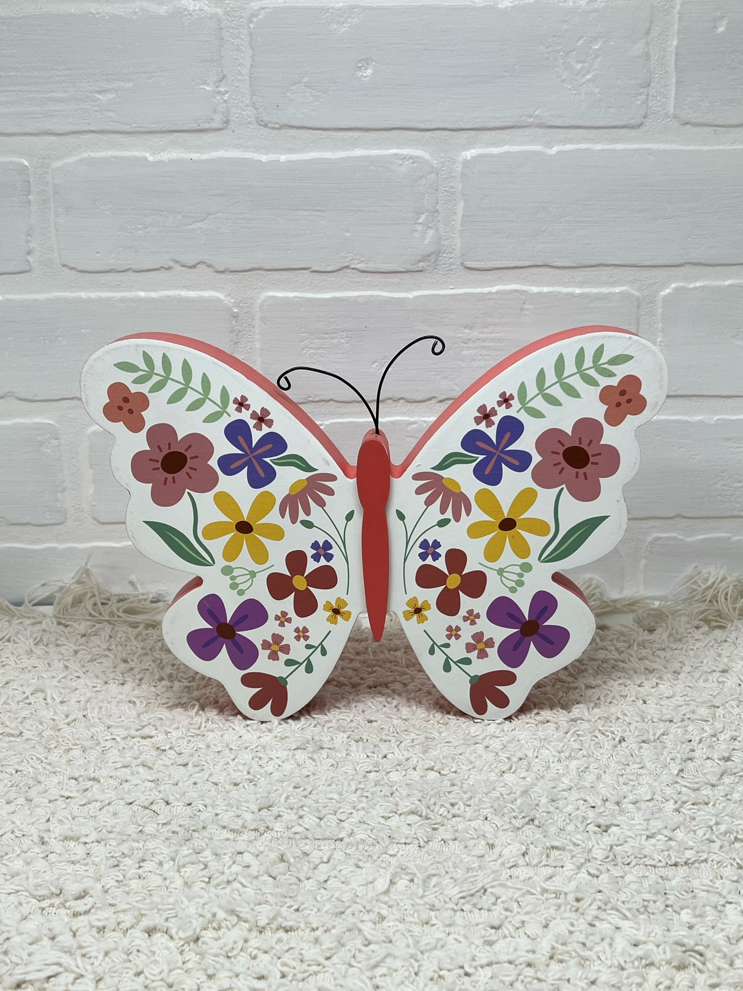 Pink multicolor butterfly shelf sitter