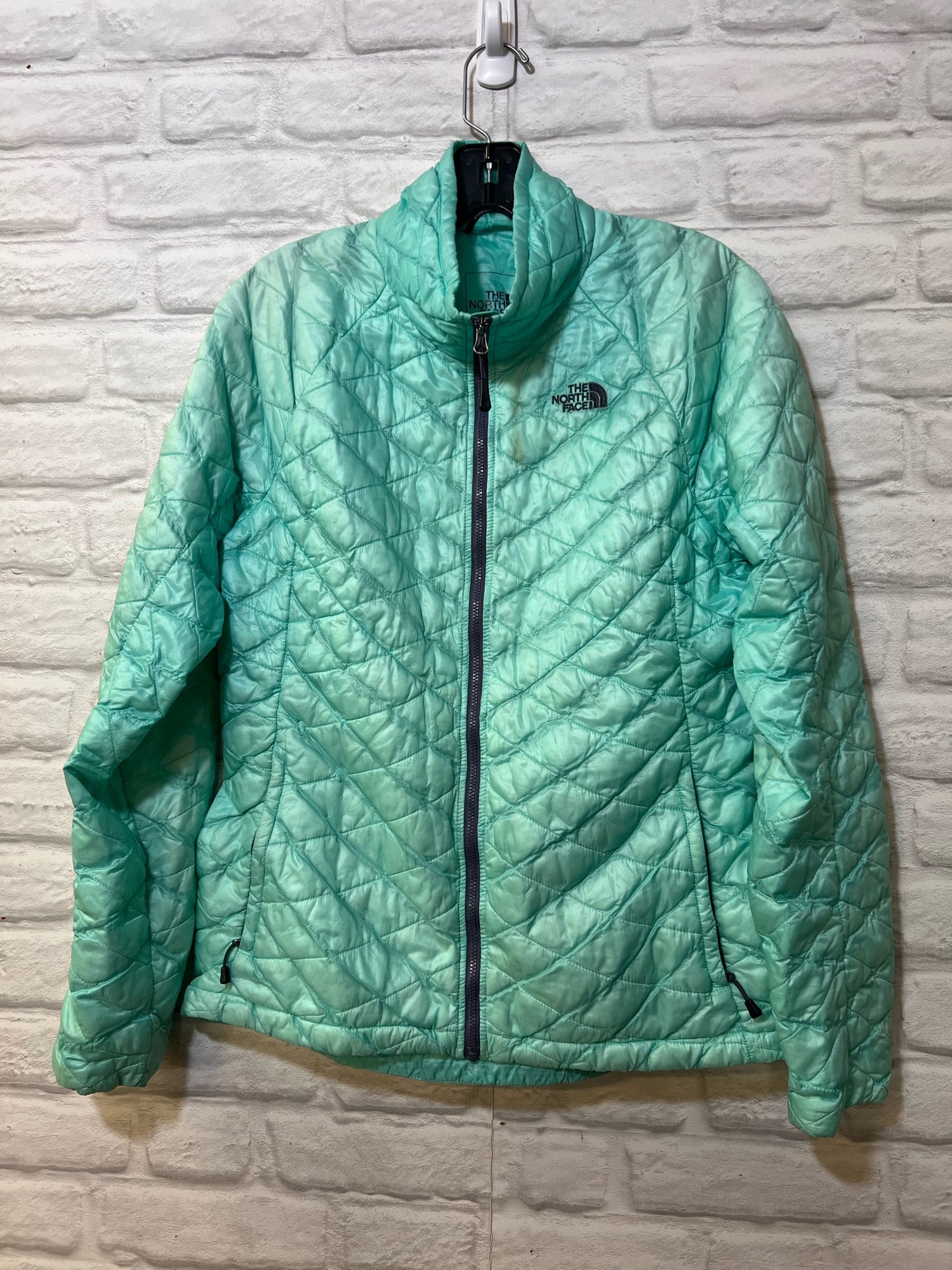 Woman wearing boutique denim jacket from Bee Balm Boutique in Harmony MN — stylish outerwear and vintage layering pieces.