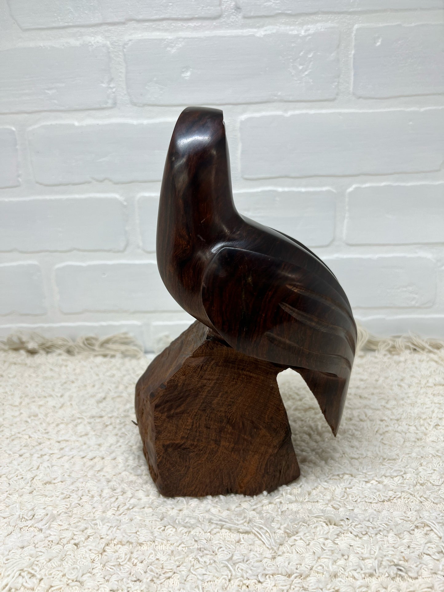 Wood carved bird statue