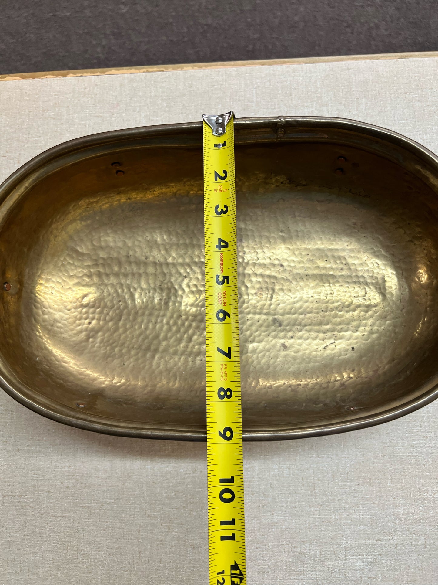 Footed hammered brass shallow oval planter