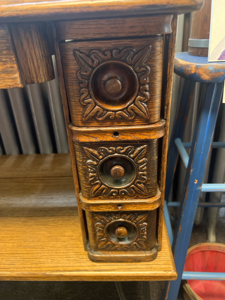 Vintage wood table made from sewing machine table