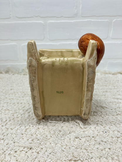 Lefton chair and pipe planter