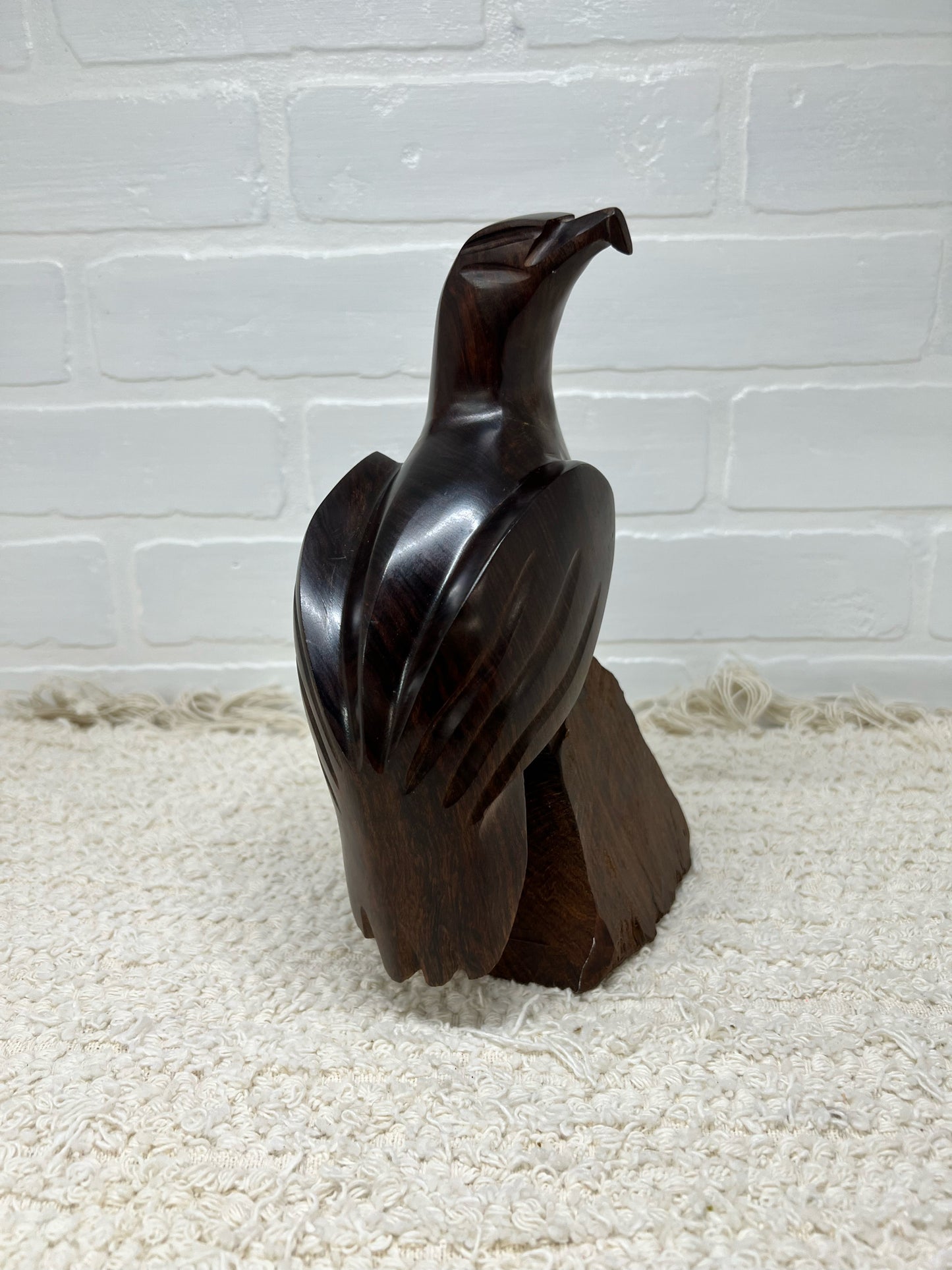 Wood carved bird statue