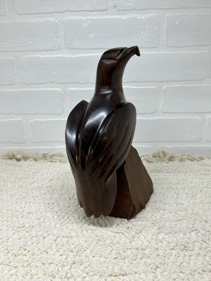 Wood carved bird statue
