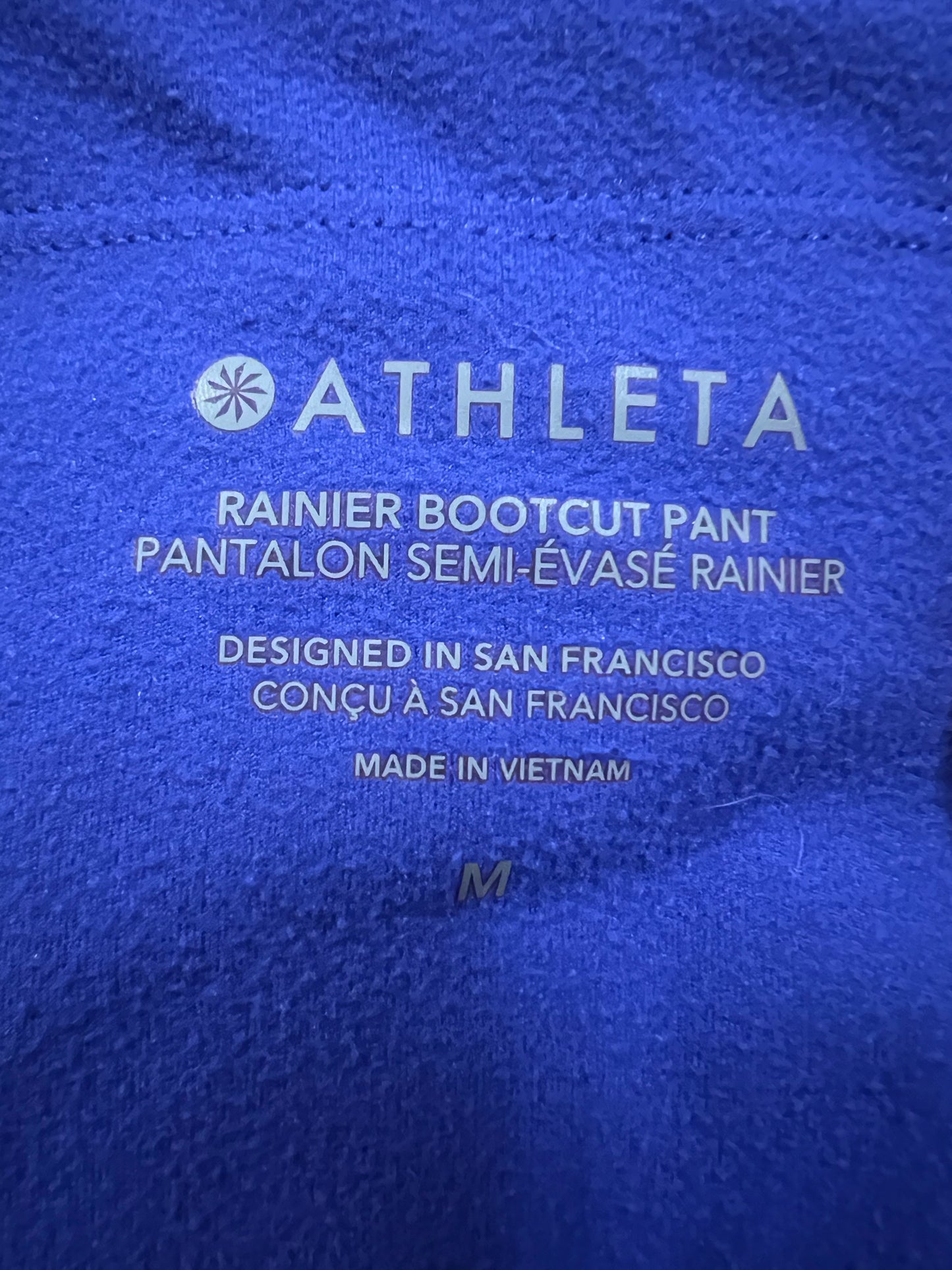 Athleta Size M Rainier boot cut fleece lined Leggings