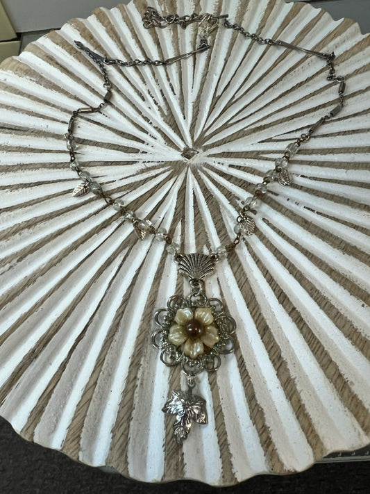 Upcycled floral pendant necklace