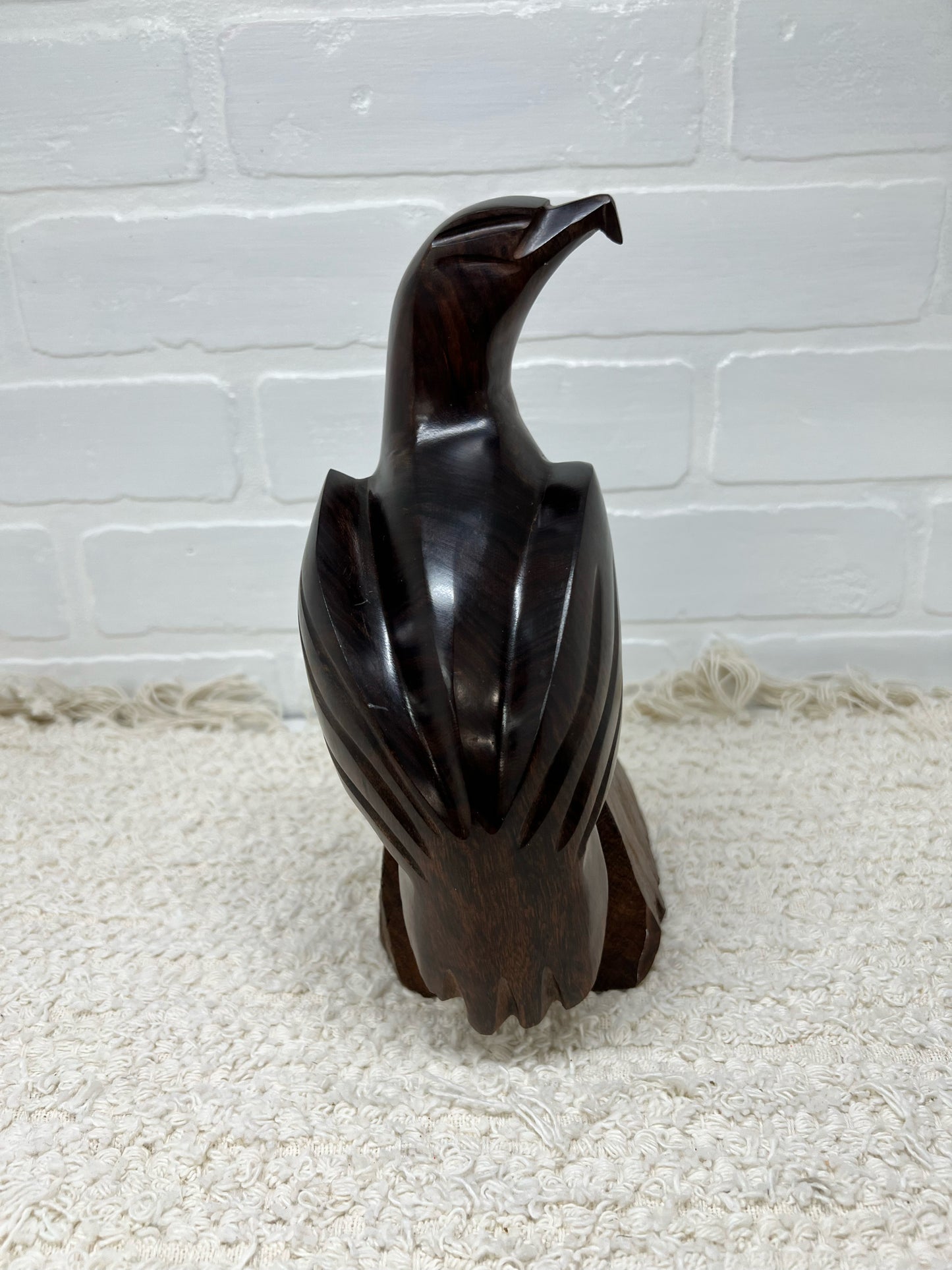 Wood carved bird statue