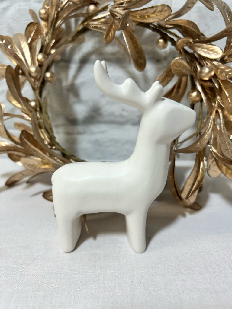 White ceramic reindeer figurine