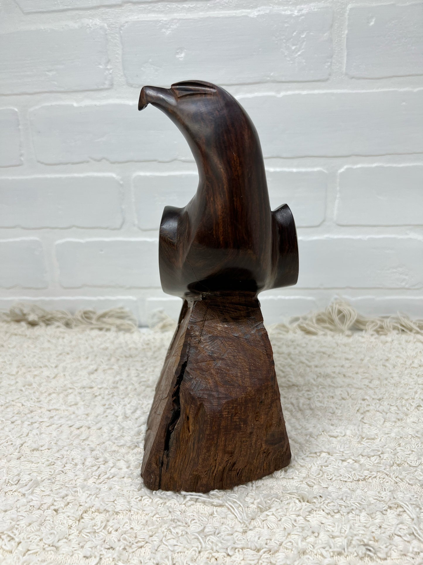 Wood carved bird statue