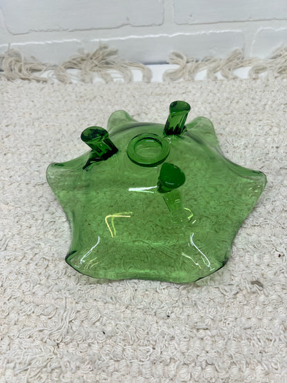Small green glass footed bowl