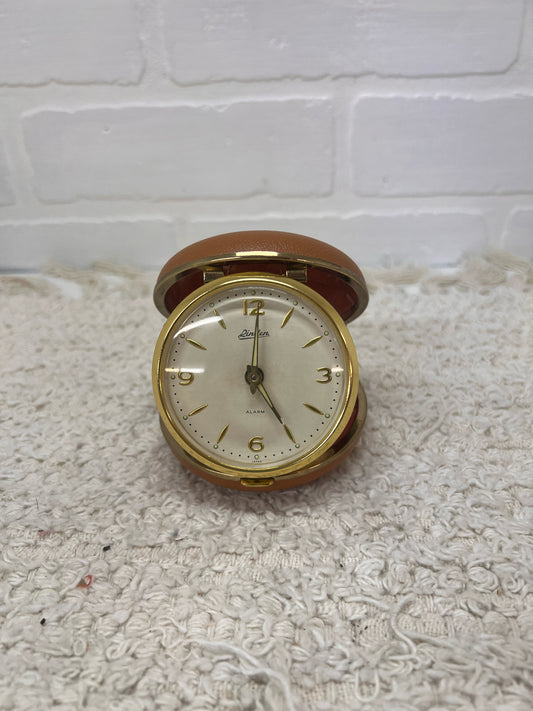 Vintage wind up travel alarm clock