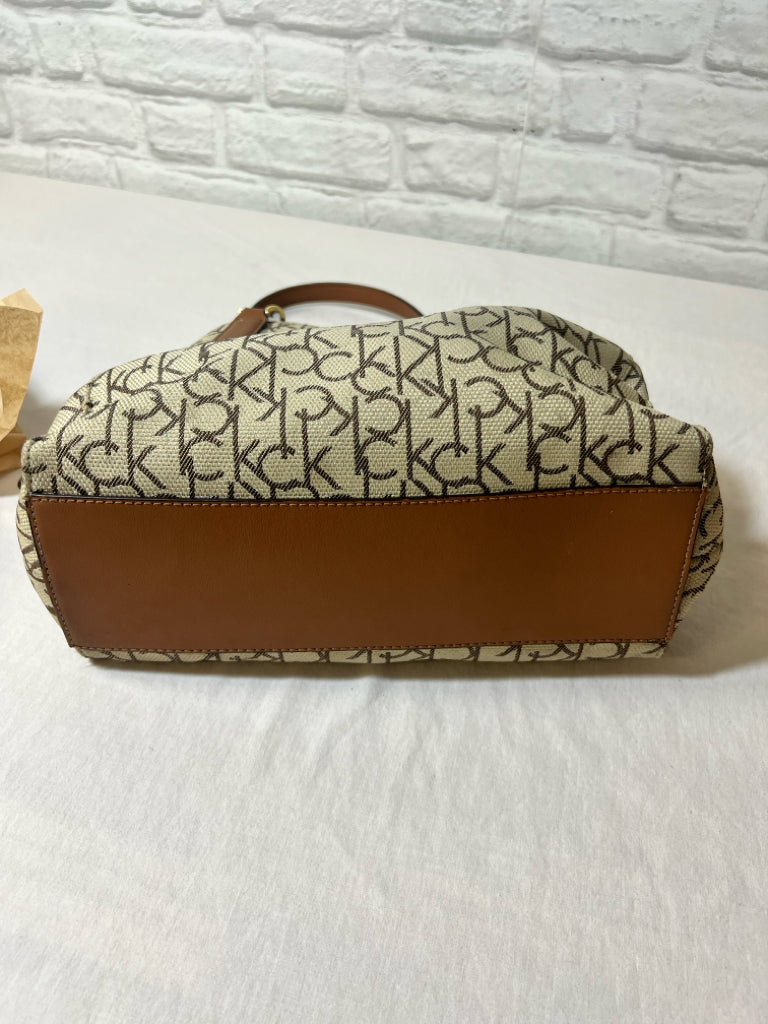 Calvin Klein tan/beige logo bag